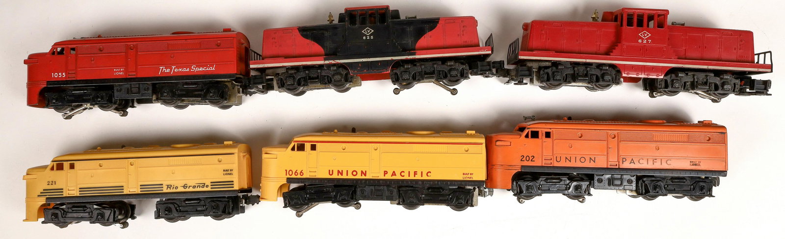 Lionel Diesel Engines - 6 [133120]: 1) #625 Engine LVGE with company logo on cab, red and black. 2) #627 Engine LVGE, red. Both switchers. 3) #1055 Engine Texas Special Alcoe A Unit, red. 4) #221 Engine, Rio Grande, Alcoe A Unit, yellow
