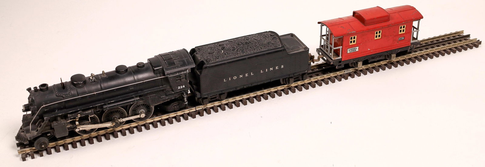 Lionel Locomotive, Tender, and Caboose [133020]: #224 Locomotive 2-6-2 with Tender "Lionel Lines" Caboose #807. C6-7.Date: 1938-42Country (if not USA): State: City: Provenance: Gary Nelson Railroad Collection