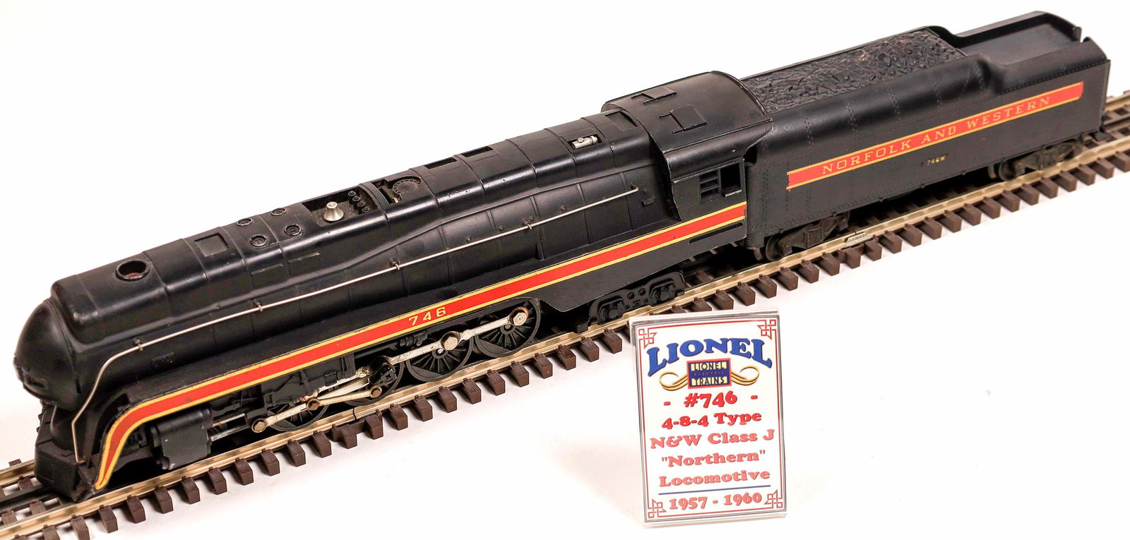 Lionel Northern Locomotive and Tender [133013]: #746 Loco 4-8-4. Knuckle couplers. Black with red and yellow trim. Norfolk & Western Railroad. C8 condition. O-scale, will not run on the sharper curved 027 Gauge .Date: 1957-60Country (if not USA): S