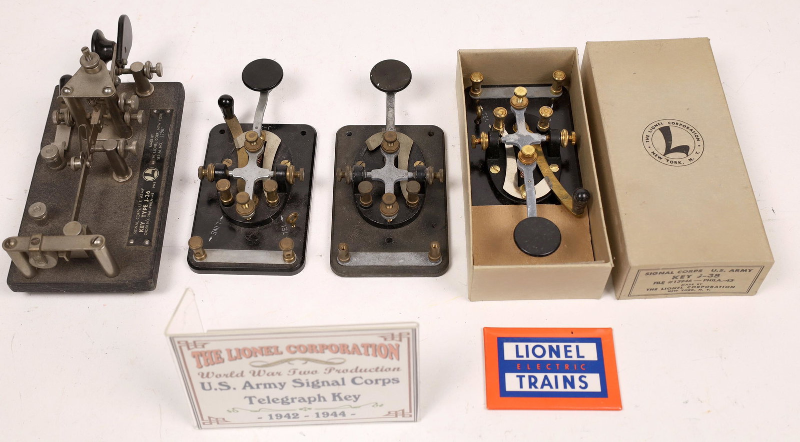 Telegraph Keys - 4 [133463]: Telegraph keys, lot of four. Three are US Army Signal Corps J-38, made by Lionel Co. one in original box. High speed telegraph key US Army Signal Corps, J-36.Date: Country (if not USA): State: City: P