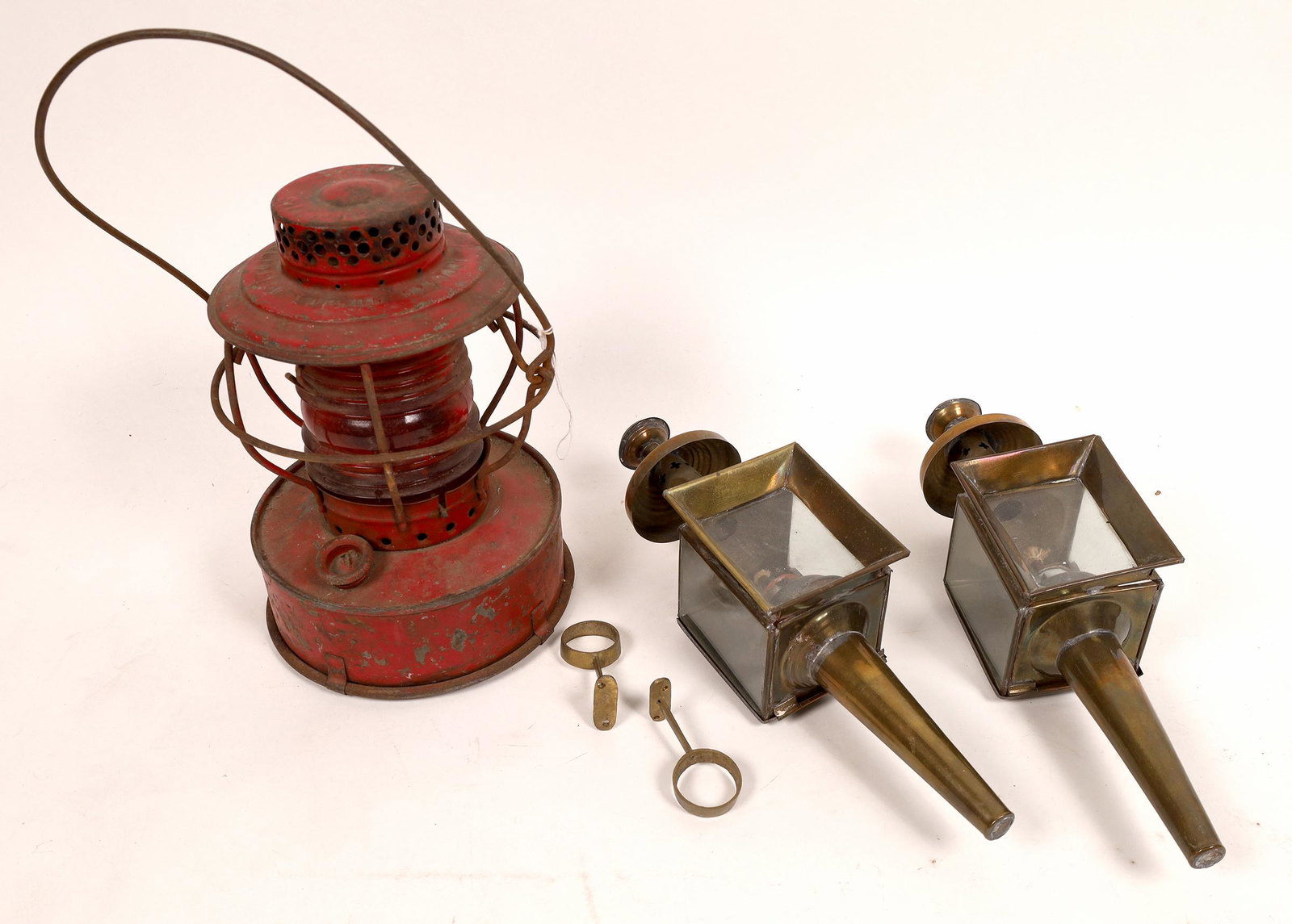 Con Ed Handlan railroad Safety Lantern [131406]: This is a Handlan Railroad safety lantern marked "Consolidated Edison St. Louis." It has a beveled red chimney. It stands about 10" with its handle down. As a bonus, we're throwing in two contemporary