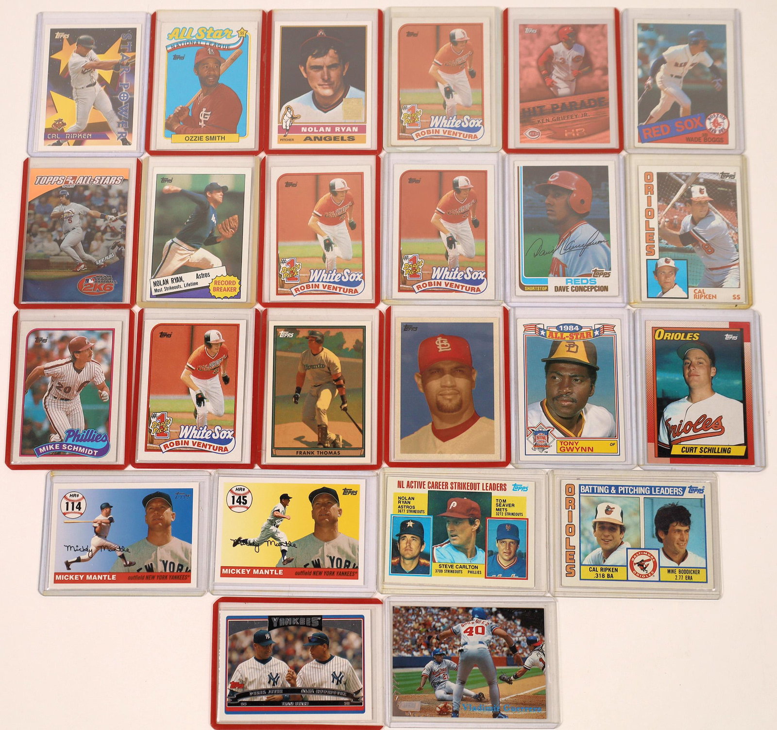 Hall of Fame Player Topps Cards [129791]: Collection of 24 Hall of Fame and future Hall of Fame player Topps baseball cards. Group of HOFers include Cal Ripken Jr, Tony Gwynn, Ozzie Smith and Nolan Ryan. Those on the way to Cooperstown includ