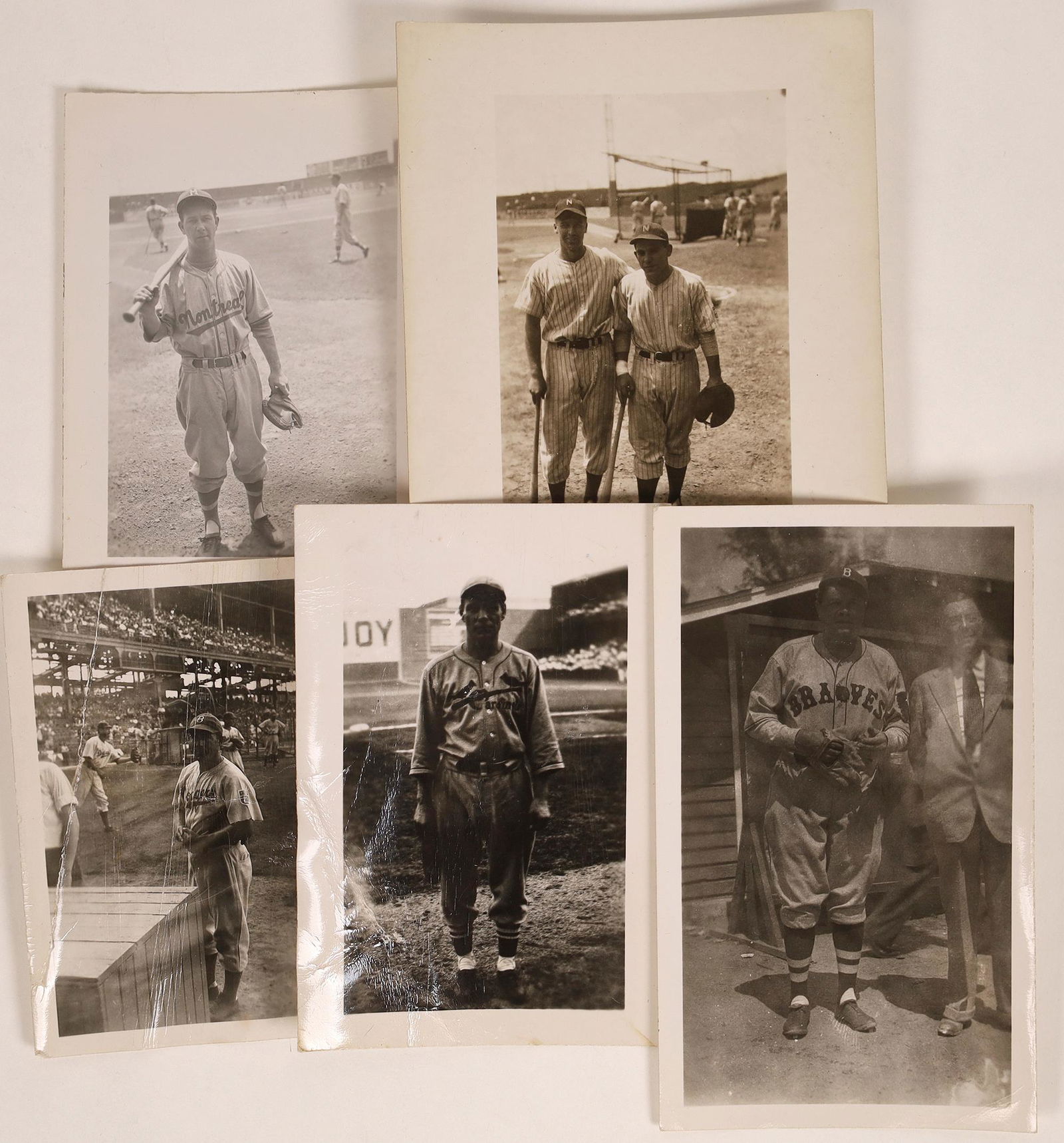 Rare Baseball Photographs of Some Famous Players: Original black and white photos of some famous players including Leo Durocher, Babe Ruth and Yogi Berra. Five photos in all. A great piece for the serious baseball collector. Most are approx. 2.5 " x