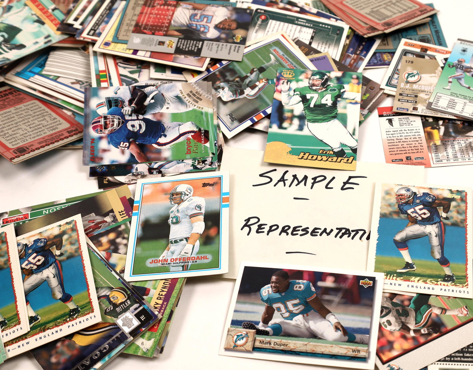 NFL's AFC East Trading Cards (400) [131111]: An assortment of approximately 400 Topps, Fleer, Upper Deck and more trading cards, featuring players from the NFL's American Football Conference East. Players featured include Ernest Givens, Ben Coat