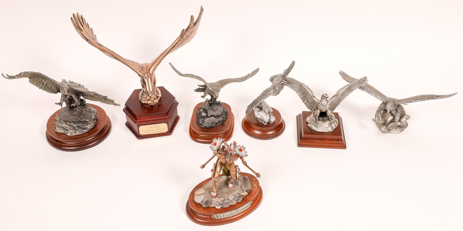 Fly with the Eagles Pewter Statues (7) [129974]: Lot of seven medium sized statues ranging from 5-11" 1.) Eagle Dancer, Polland 1984, Autographed in 91, 283/1200, 283/1200 2.) Eagle, H Wilson, 1980, 139/5000. 3.) Freedom by Georges deLodzia, 1980, 2