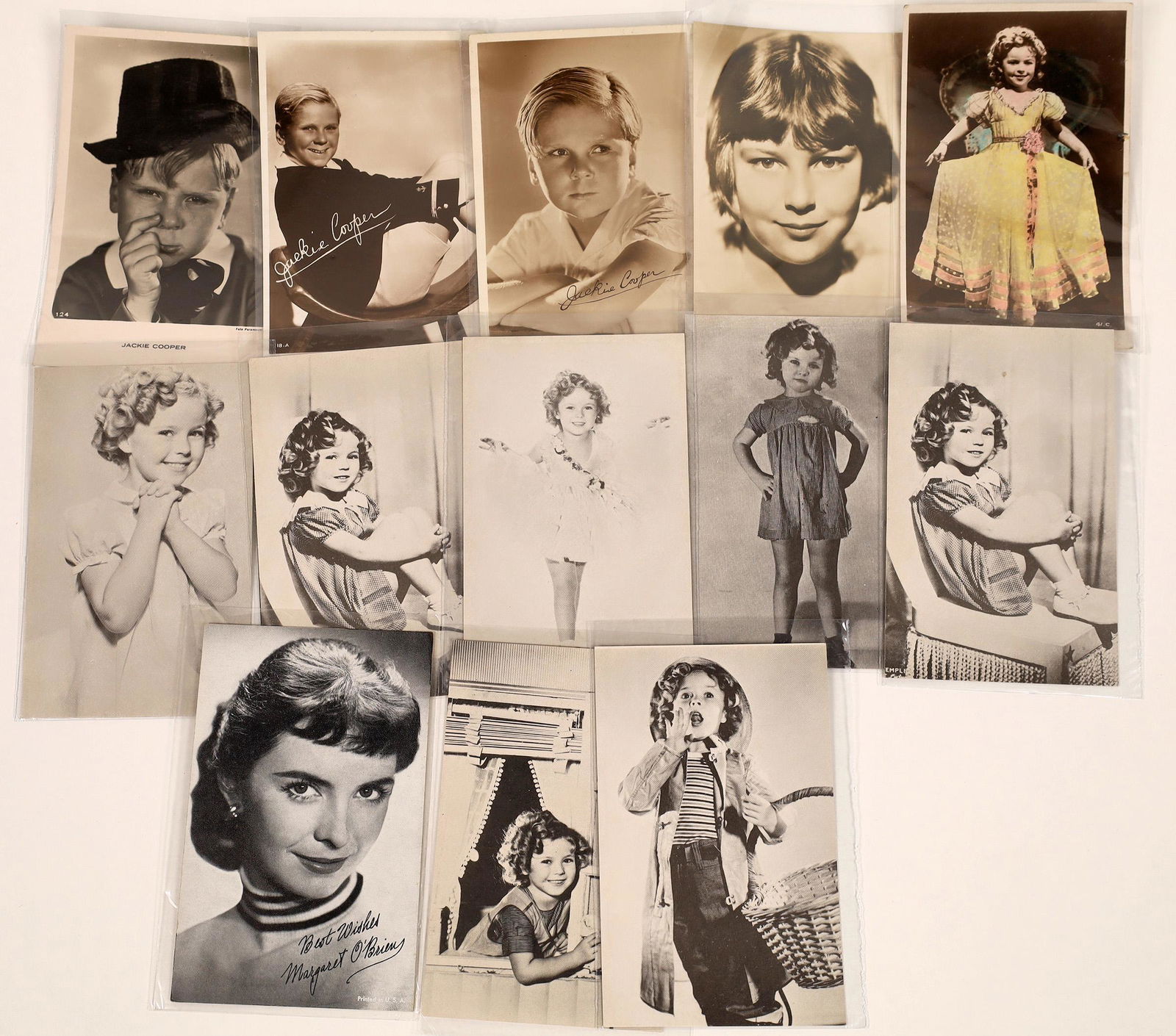 Child Star RPC's (13) [128901]: A nice little collection of 3.5"x 5.5"photos featuring child stars of the silver screen. First we have eight cards featuring one of the biggest little stars of the 1930's, Shirley Temple who was the n