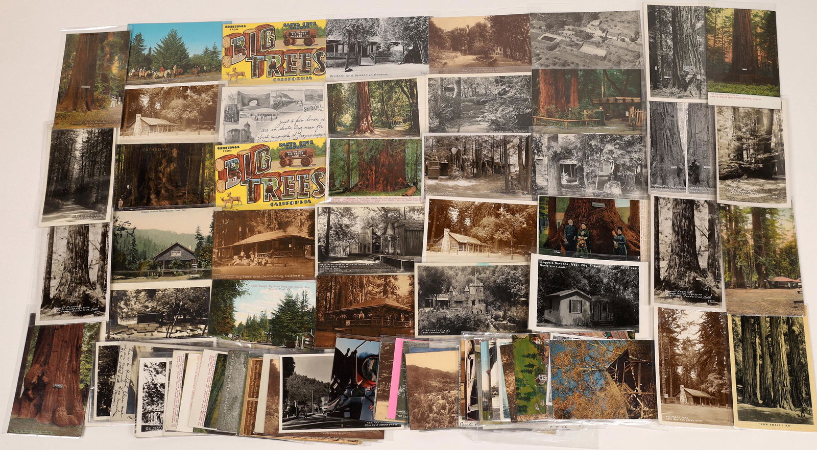 Scenic Postcards of the Santa Cruz Mountain Area (80): RPC's and postcards featuring the areas and towns outside the seaside town of Santa Cruz California. Various cards show towns along Highway 9, like Ben Lomond, Brookdale and Boulder Creek. There are a