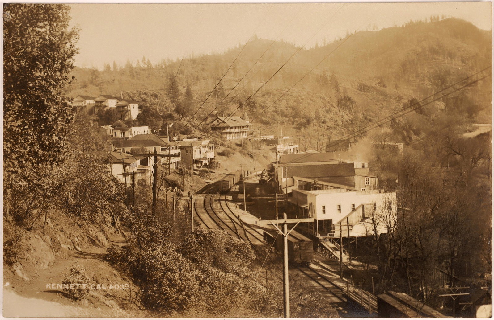 Kennett Real Photo Postcard [128534]: Kennett was an important copper mining town that was submerged when the Shasta Dam was built. Here's a real photo postcard showing what it looked like. Date: Country (if not USA): State: CaliforniaCit