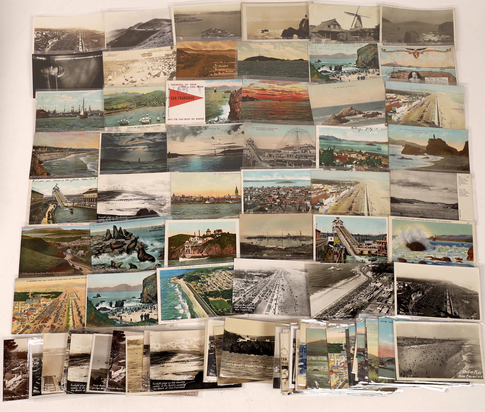 San Francisco Beaches and Harbor Postcard Collection: Lot of 86 vintage postcards depicting San Francisco beaches, harbors and waterfront scenes. 60 unused, 26 postmarked. Ocean Beach, The Chutes waterpark, entrance to the Golden Gate, sunset at Lands En