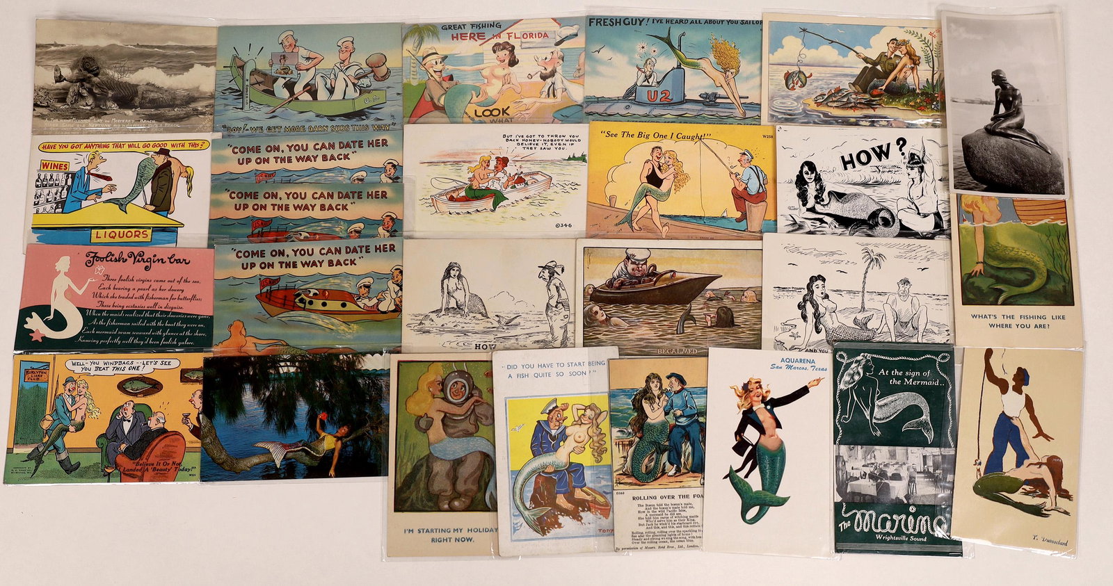 Mermaid Postcard Collection [128378]: Lot of 26 postcards with mermaids. Many cartoons. Real photo cards of The Little Mermaid of Copenhagen and one on Monterey Beach. Date: Country (if not USA): State: City: Provenance: Ken Prag Collecti