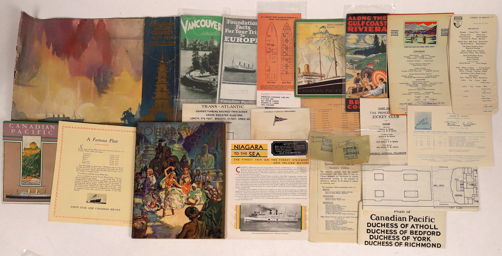Canadian Pacific Steamship Ephemera Collection: Lot of over twenty pieces from Canadian Pacific Steamship Line: 1927 & 1930 Around the World art deco brochures; Abstract Logs from 1937 & 1939; menus, brochures and others.Date: Country (if not USA):