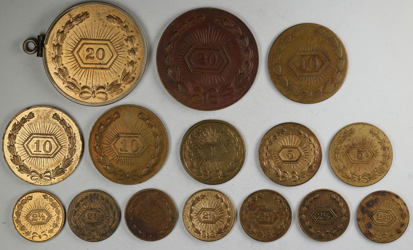 Radiant Wreath Counter Collection [123072]: Lot of fifteen. Twenty Dollars: 2005/2010, 2015/2020. Ten dollars: 2020/2025, 2020/2030, 2035/2040. Five dollars: 2015/2020, 2025/2030. Two and a half dollars: 2003/2002, 2005/2010, 2005/2050, 2050/20