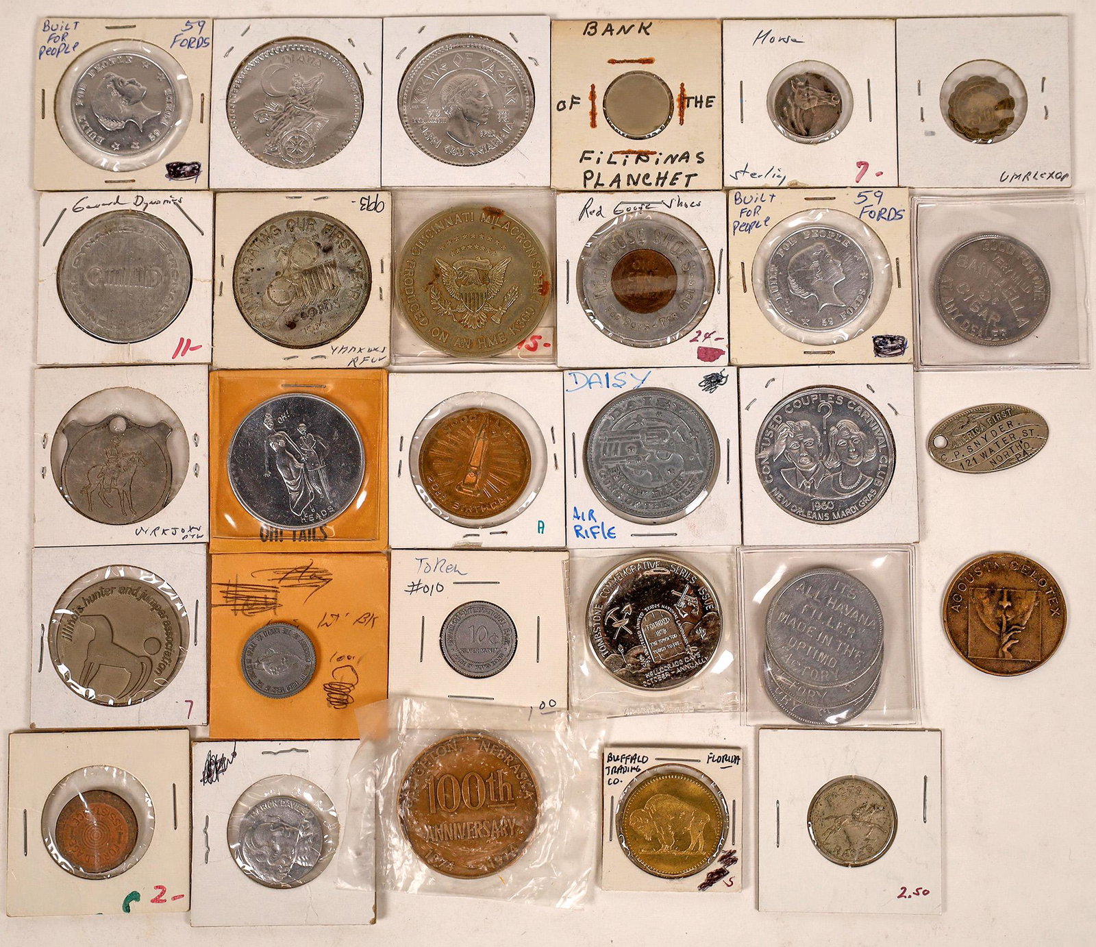 Token and Medal Collection [124748]: Lot of 32 eclectic tokens and medals: Illinois Hunter and Jiumper Assocation; 100th anniversary Creighton, Nebraska 1974; Daisy Dollar Air Rifles; Marion Davies; Buffalo Trading, Orlando, Florida; San