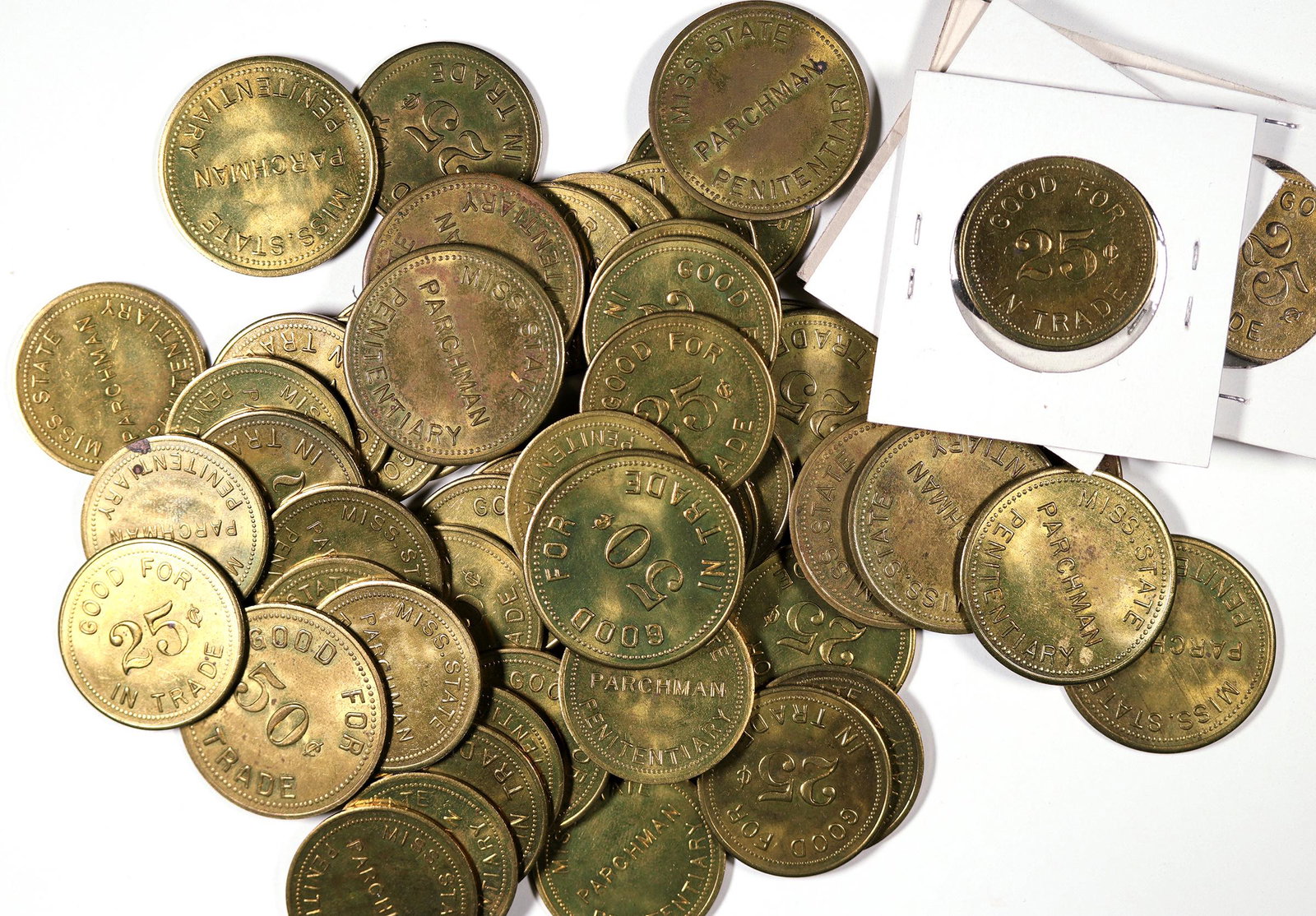 Parchman Farm Mississippi Prison Tokens [128485]: Dealers lot of 56 tokens. Obv.: Miss. State / Parchman / Penitentiary; Rev.: Good For / 25c or 50c / In Trade. Rd., br., 25c=28 mm; 50c=32 mm. 13 GF 50c; 43 GF 25c. Mose Allison, the great blues singe