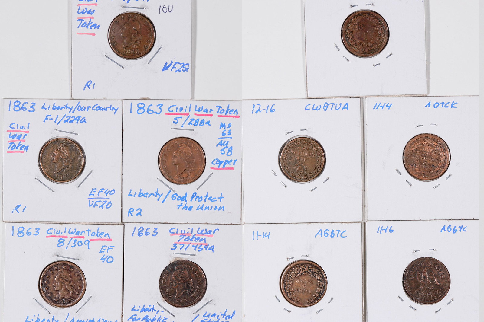 Capped Liberty Civil War Tokens [129171]: Lot of five: 1) F-1/229.a.Liberty/Our Country; EF 40, R1; 2) F-1/391.a.Liberty/I.O.U. 1 Cent; VF 25, R1; 3) F-37/434.a. Liberty, United States Copper; EF 40, R2; 4) F-8b/309.a. Liberty/Army & Navy; EF
