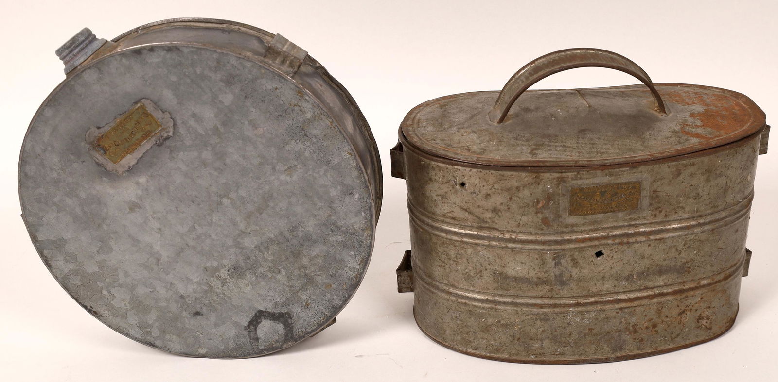 Vintage Leadville Lunch Bucket & Canteen [121699]: Two really great pieces from the mining town of Leadville, Colorado. First we have a miner's lunch bucket with exterior hooks to hold miner's candlesticks for a mood lit meal. Bucket measures 7"x 10".