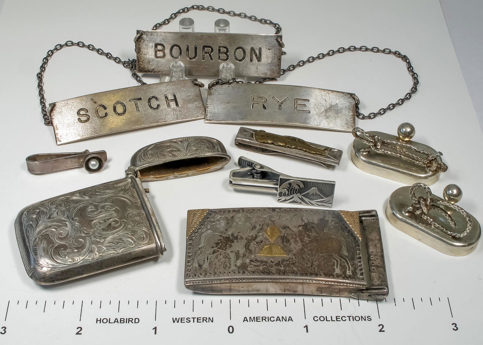 Vintage Silver Accoutrements [124841]: 1) Engraved antique lighter cover[x=#8212/]initials [x=#8220/]GMS[x=#8221/]. 2) Hand engraved belt buckle with gold touches. Image of male and female centaurs. 2.5[x=#8221/] x 1.5". 3) Antique gold pl