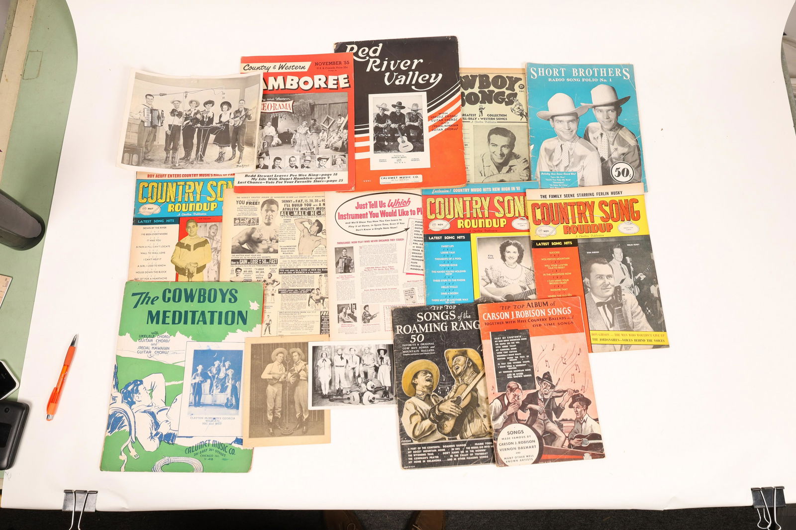 Magazines of Cowboy/ Sheet Music [129889]: Lot of 14. Three photos of musicians Includes Carson J. Robinson Song, Songs of the Roaming Ranger, The Cowboys Meditation and The Letter That Never Came. Magazines: Cowboy Songs, Short Brothers , Cou