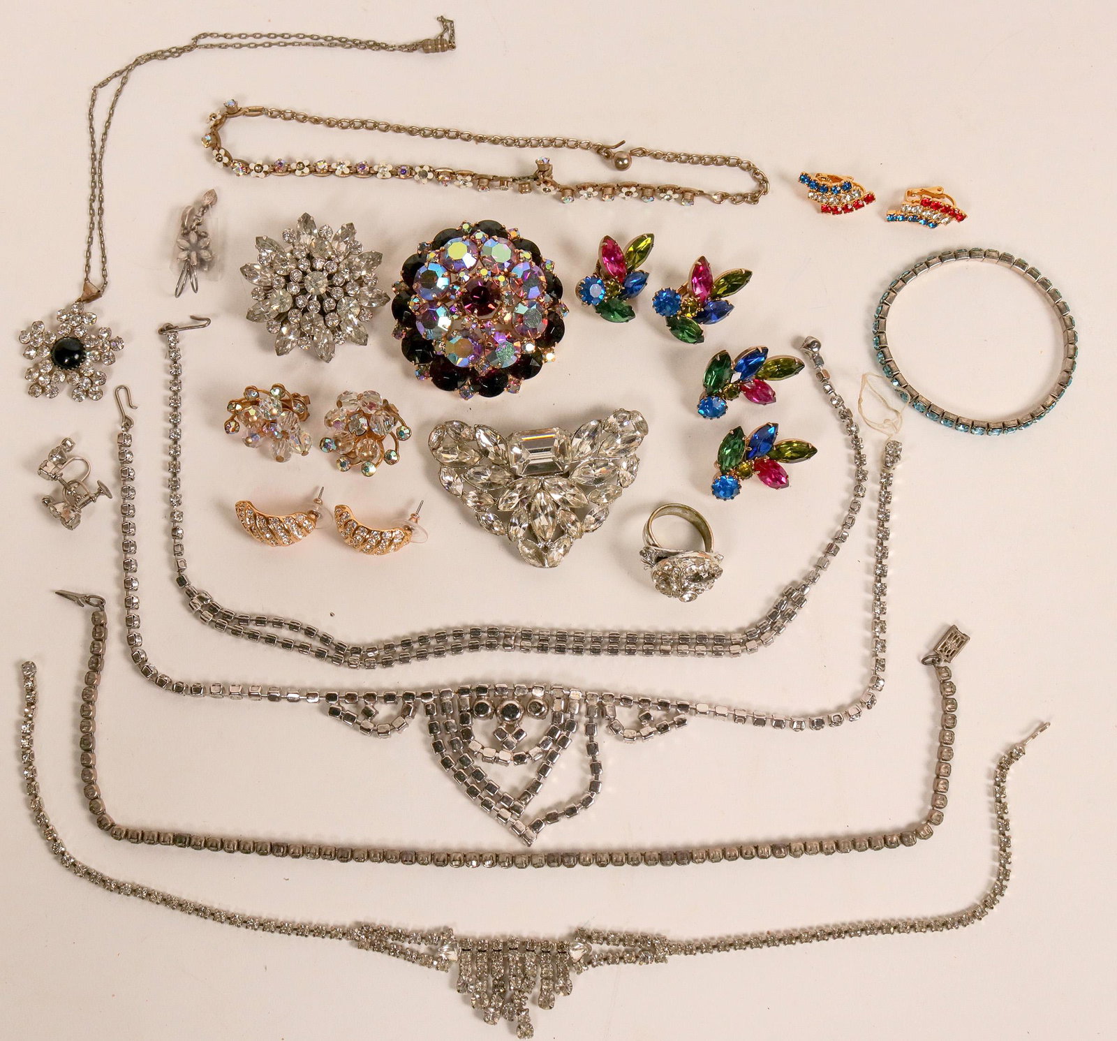 Sparkle Plenty Jewelry [121208]: Large group of sparkley costume jewelry: Pins/Broaches, Earrings, necklaces, rings...faux diamonds and more. "Steppin' out tonight" Date: Country (if not USA): State: City: Provenance:Date: Country (i