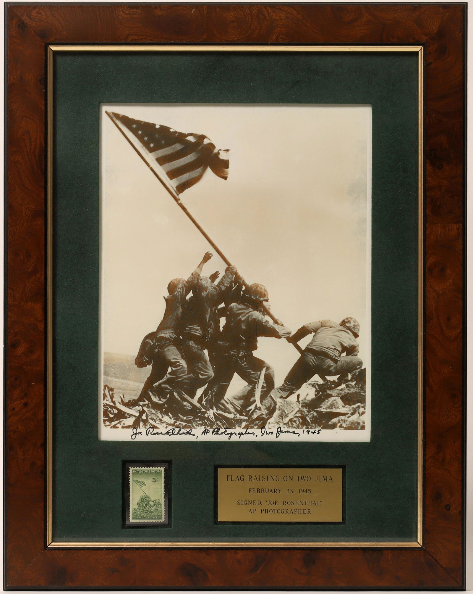 Framed Flag Raising Iwo Jima Photograph Signed by: Nicely matted and framed signed photograph and stamp of iconic Flag Raising on Iwo Jima. Photo print is 8 x 10", signed in black marker "Joe Rosenthal, AP Photographer, Iwo Jima, 1945." Also 3c green