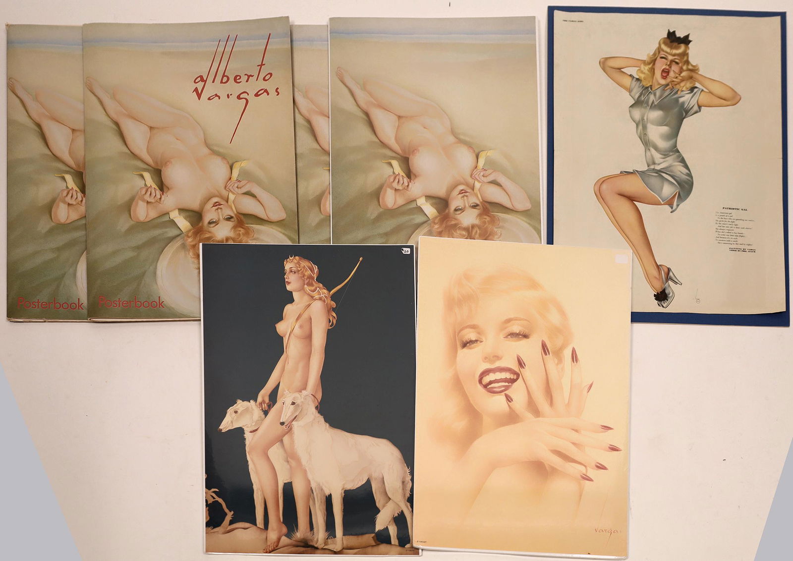 Alberto Vargas Posterbook Collection in Prints: The Taschen Posterbook contains six Vargas prints: Feline Entre-Act 1919, the Spanish Gipsy 1928, Diana The Huntress 1929, Redhead on the Beach 1950, Ivory and Black 1950, En Garde Marilyn Monroe 1957
