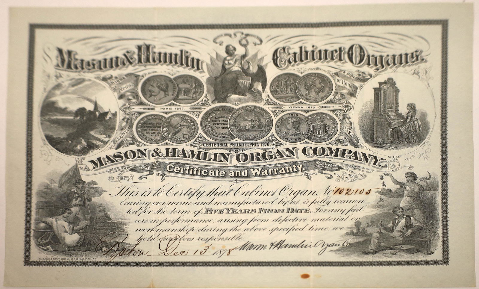 Mason & Hamlin Cabinet Organs Fancy Warranty: Incredible warranty certificate from the cabinet organ maker granting the purchaser a five-year warranty on purchase. The certificate shows ten medals and diplomas of honor the company had won through
