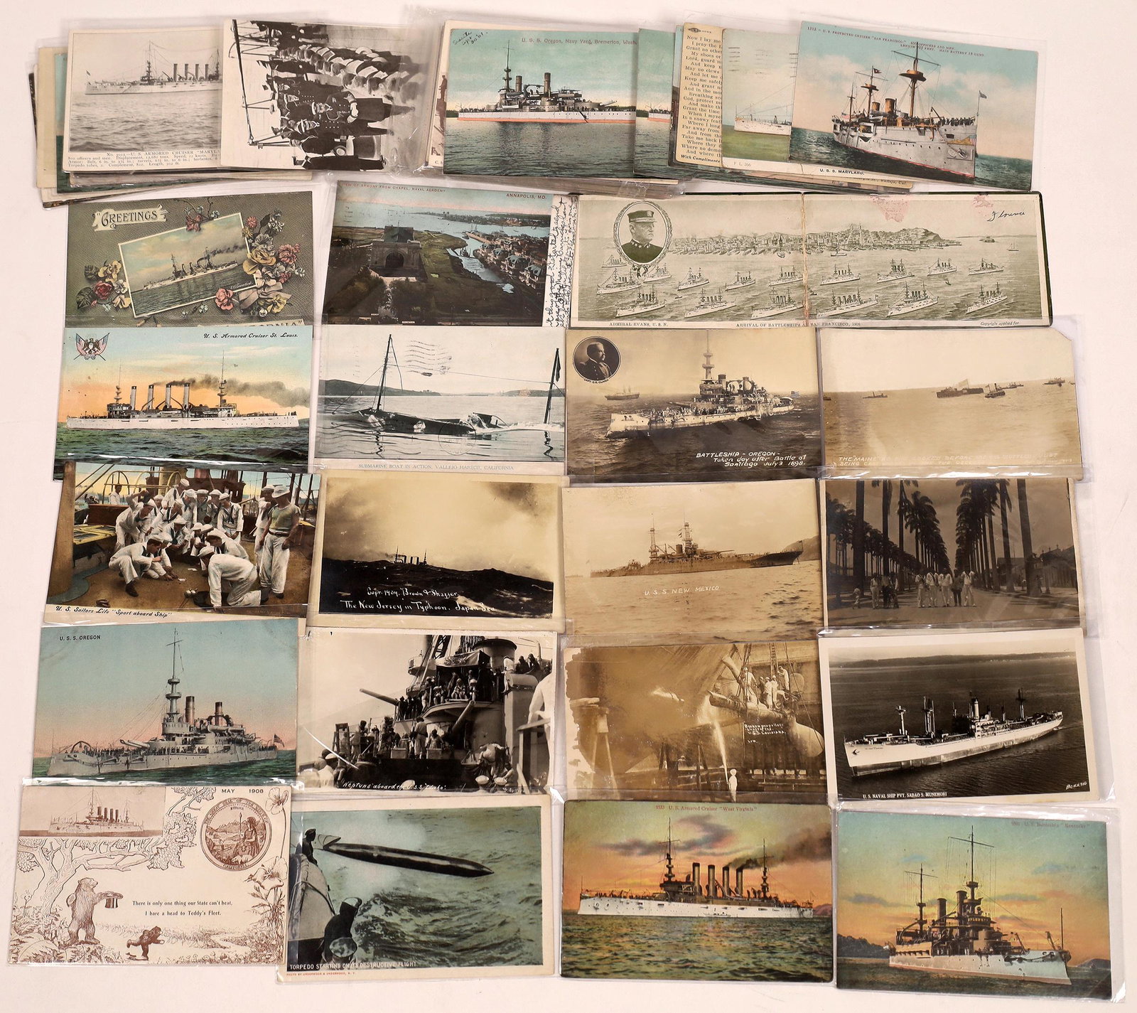 US Battleships Postcard Collection (70) [142559]: Lot of 70 items. Postcard collection of battleships and submarines. Collection includes two undivided backs with approx. 15 RPCs and 20 prints of US Navy battleships. There is also a collection of app