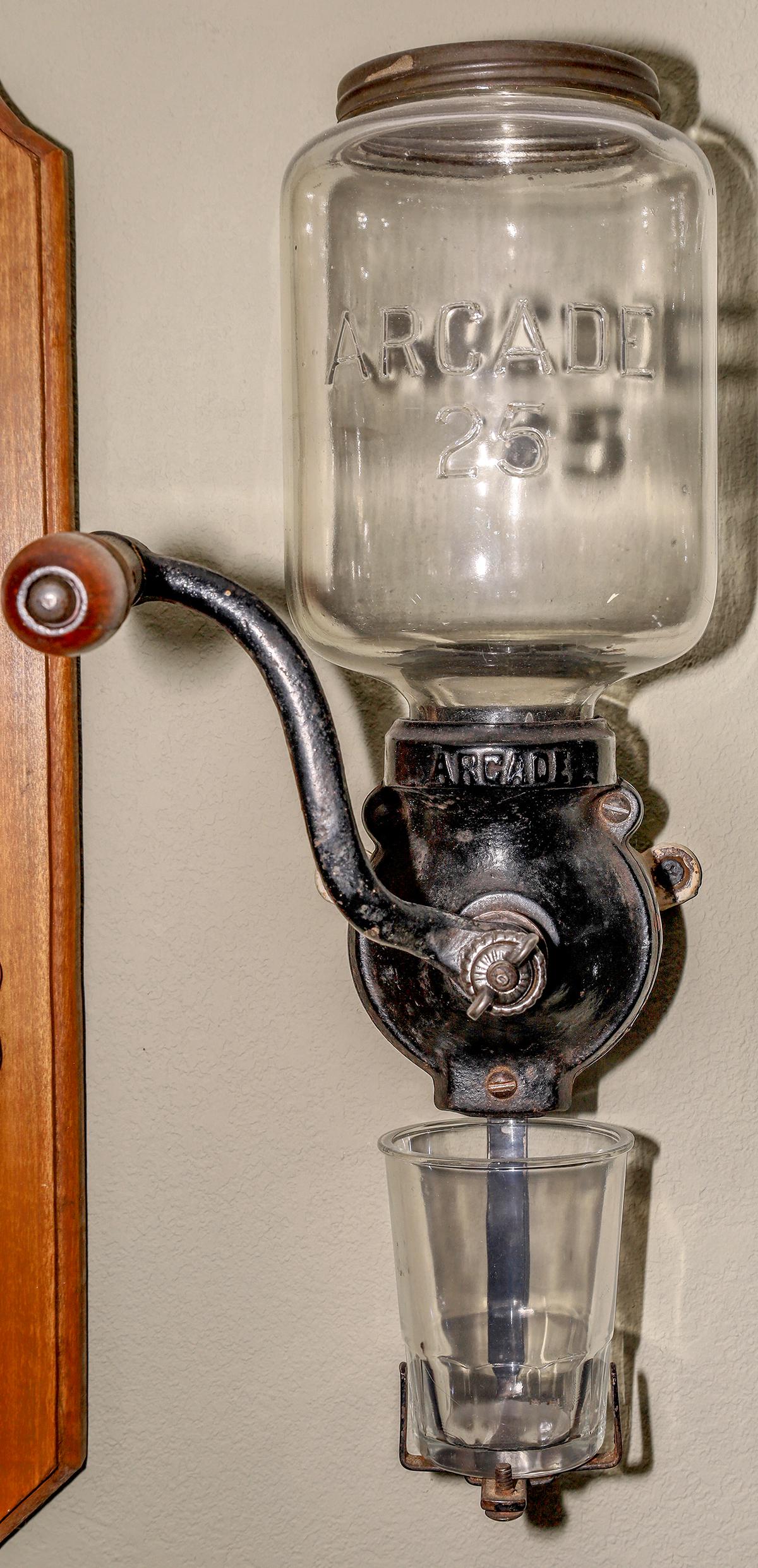Arcade Crystal Palace No.25 Coffee Grinder [140061]: Block letters, plain body. Sivonda 173 (catalog #5-43) . Macmillan 57. 15 x 5 x 7Date: Country (if not USA): State: City: Provenance: