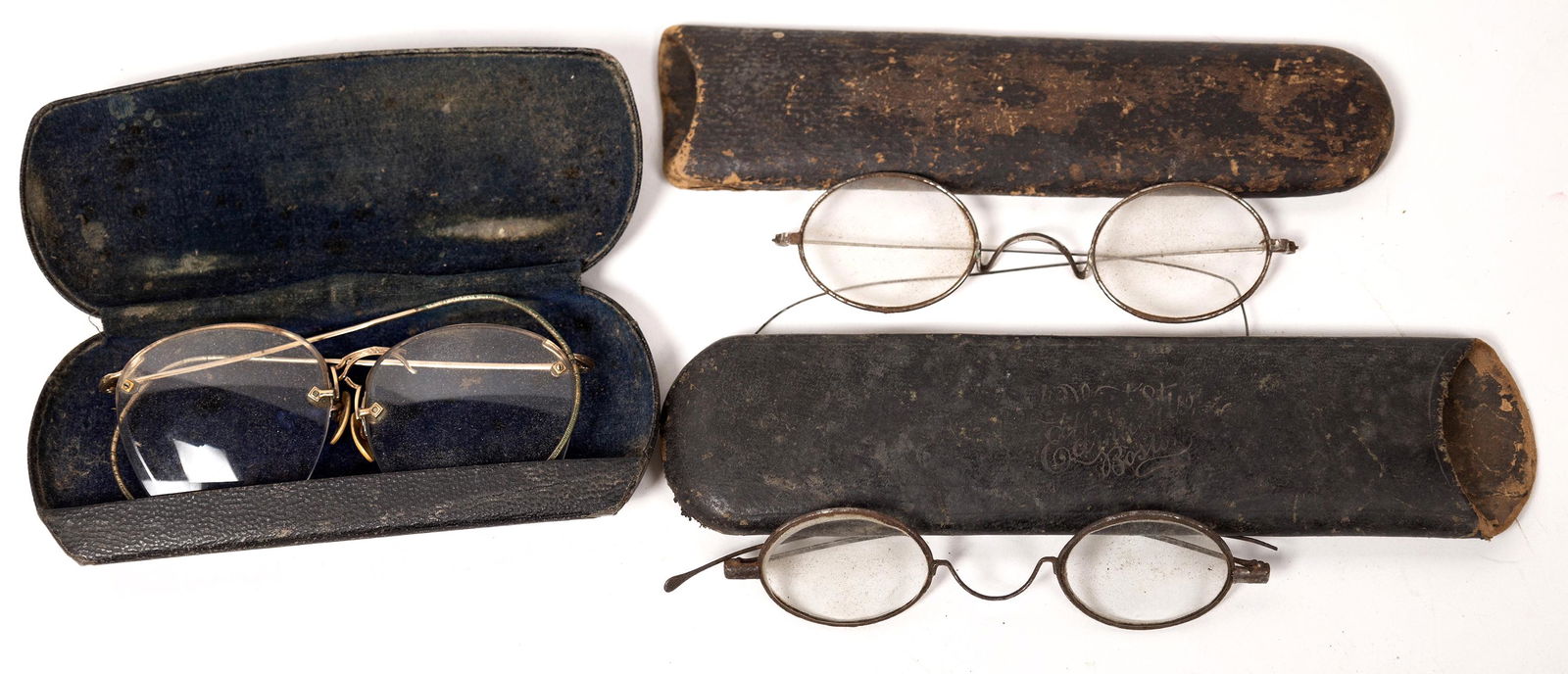Old Eyeglasses. 3 Pairs [152676]: 3 old pairs of eyeglasses in leather cases. 2 pairs in sliding case are c. 1860-70, other c. 1900-20. We do not see old pairs like these too often.Date: Country (if not USA): State: City: Provenance: