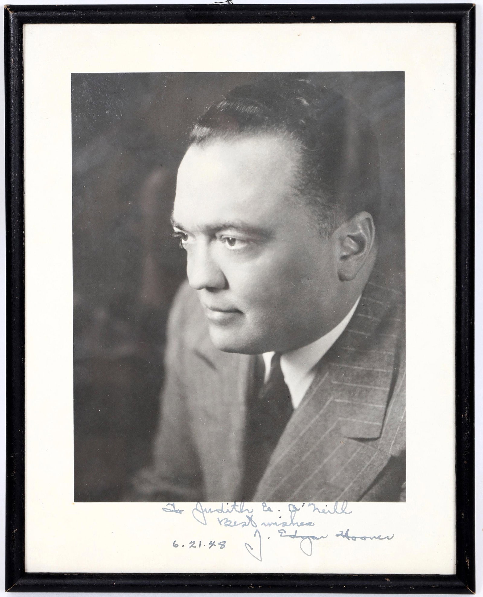 J. Edgar Hoover Autographed Photo, 1948 [157141]: Autographed photograph of J. Edgar Hoover. It is signed, "To Judith E. O'Neill, best wishes, J. Edgar Hoover. 6/21/48." Hoover was the director of the FBI from 1935 to 1972. This photograph is framed 