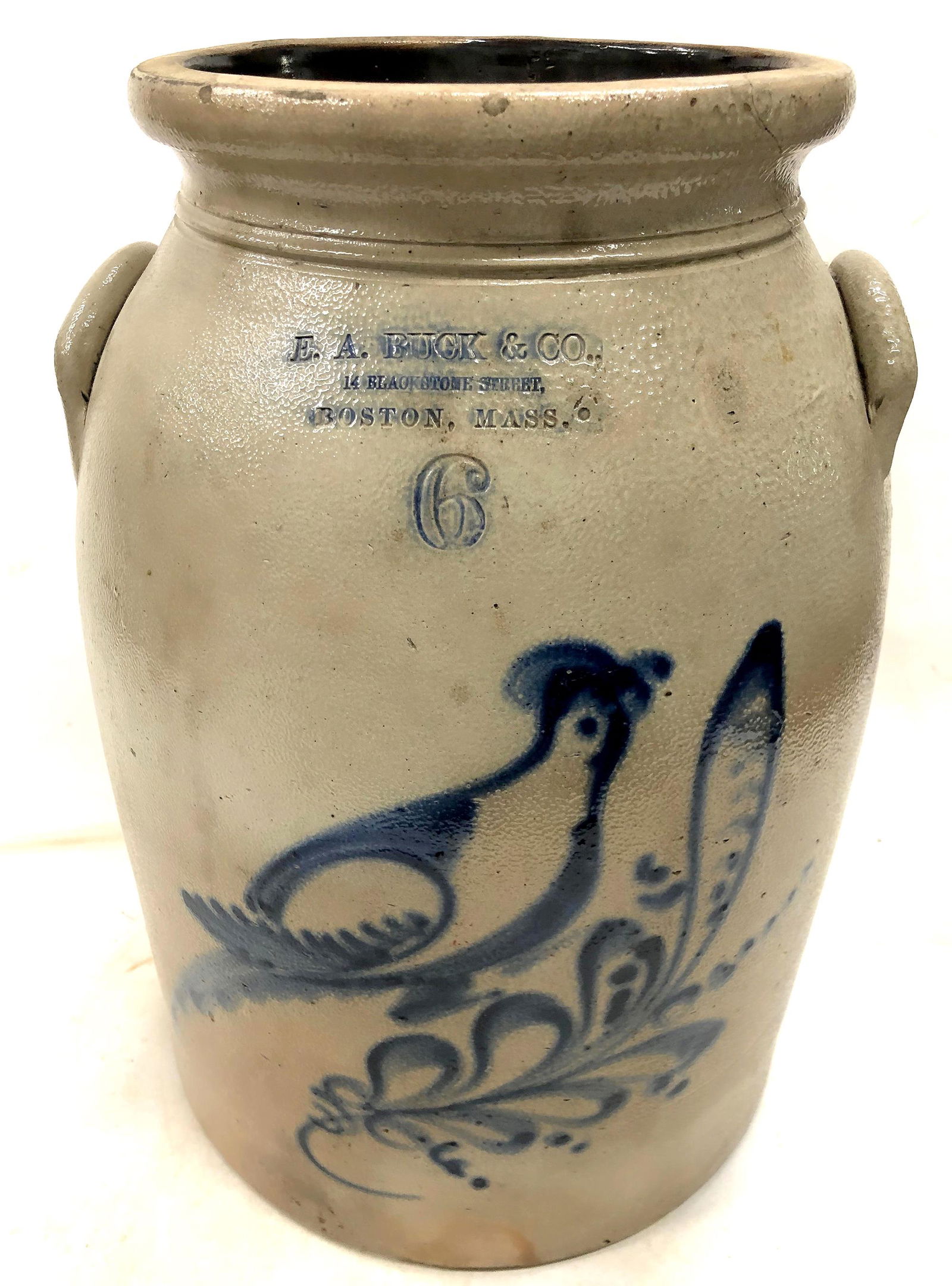 E A Buck Stoneware, 6 Gallon [159825]: E. A. Buck & Co./14 Blackstone Street,/Boston, Mass/6. Blue bird pattern. 16.5x12". 2.5" lip crack, a few lip chips, largest .75".Date: Country: State: MassachusettsCity: BostonProvenance: Gary Bracke