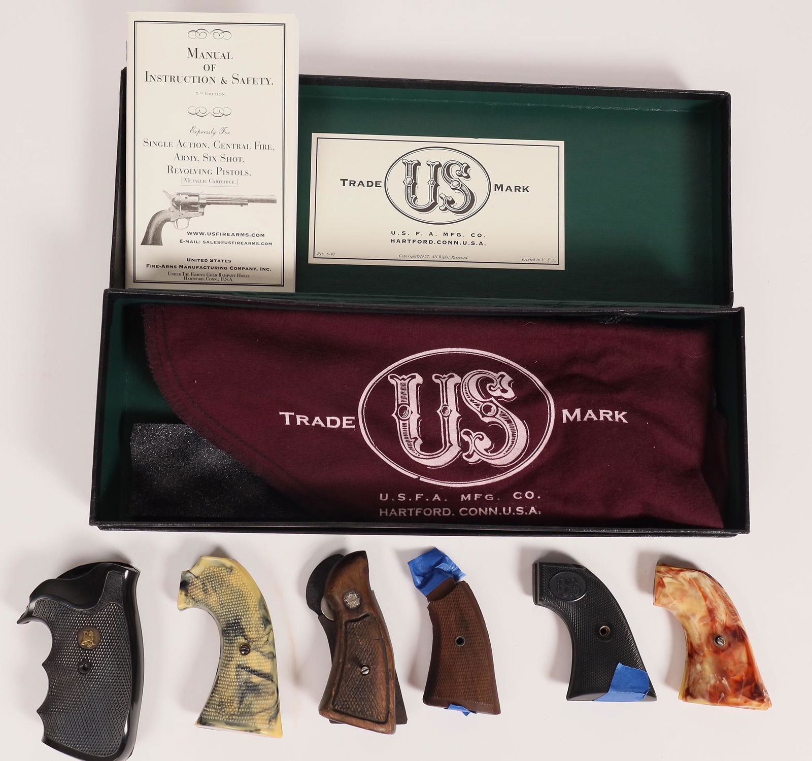 Pistol Grips US Firearms, Colt 1, Smith & Wesson [157354]: This lot has like new grips for a US Firearms SAA revolver with sock, original box and an owner's manual. There are Pacmayr grips made for the Colt 1 frame that fits the Python OP and a Trooper pre-19