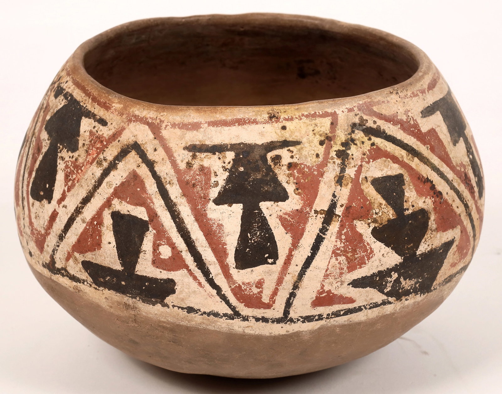 Vintage Cochiti/Santo Domingo Bowl [150729]: Very old Cochiti or Santo Domingo red ware bowl with black, white and red geometric design. Round bottom with signs of use. 4"x7". 1.5". Crack from rim downward, please inspect. New Mexico