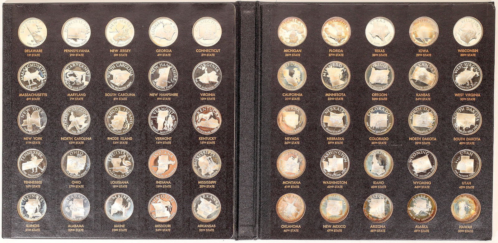 Franklin Mint: States of the Union [169863]: Issued by the Franklin Mint 1969-1970: Standard Edition of The States of the Union with fifty state medals and a 71 page booklet with state histories edited by Readers Digest. The Sterling Silver set