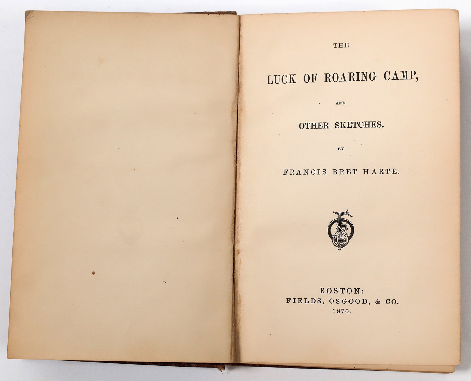 Luck of Roaring Camp, First Edition, 1870 1870 [156154]: The Luck of Roaring Camp, and Other Sketches by Francis Bret Harte. First edition published by Fields, Osgood & Co. in 1870. The short story, "The Luck of Roaring Camp," was originally published in Ov