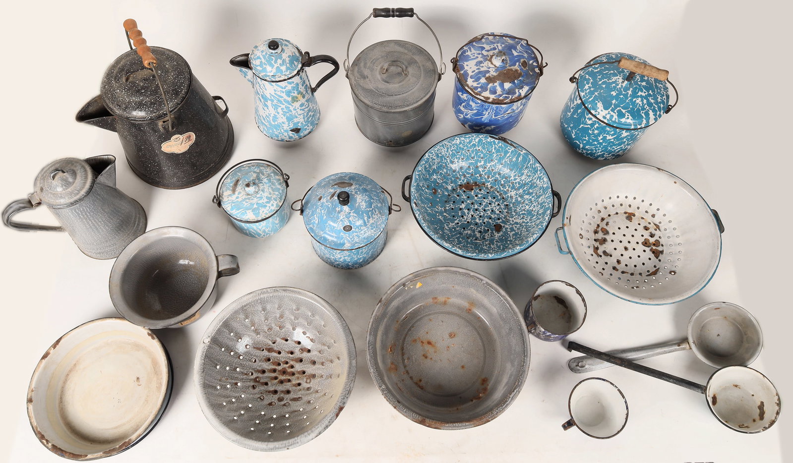 Pioneer Speckleware (26, Two Boxes) Includes Lids 1900s [172717]: A whole cupboard full of pioneer speckleware including items from Columbia, Agate Nickel Steel, Haberman's Granite Ware, Vollrath and probably a couple of more that can't be identified. Pots, bowls, c