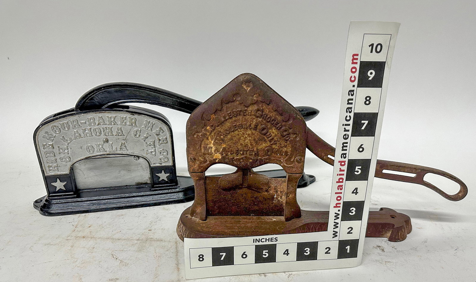 Oklahoma Plug Tobacco Cutters (2) [172551]: 1) Ridenour -Baker Mer Co / Oklahoma City / Okla. No patent date, long handle & base. Approx. 19". 2) McAllister Grocery Co / Wholesale Only. McAllister, Oklahoma. Oklahoma Gary Bracken Collection