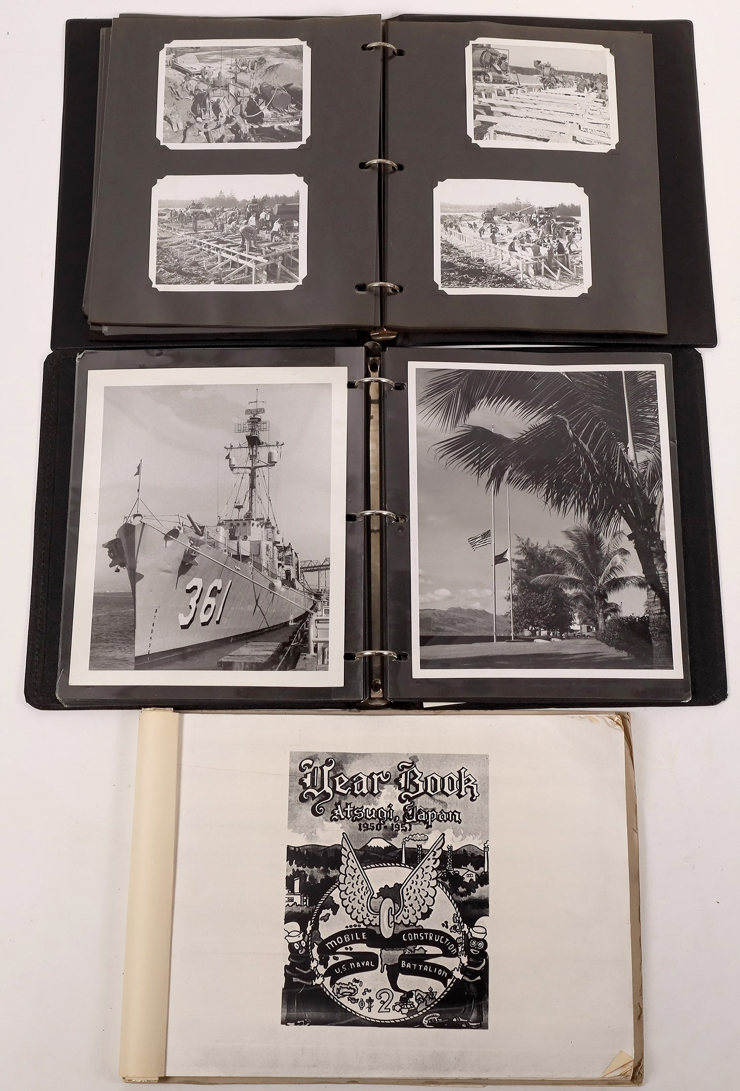 Navy Seabee Atsugi, Japan Yearbook and Photos, 1952 [161886]: 1952 Navy Seabee yearbook for Navy Mobile Construction Battalion 2 stationed at Atsugi, Japan. 10.5x14.5" flip style binder for this unit that rebuilt a former Japanese naval station for US Navy use. 