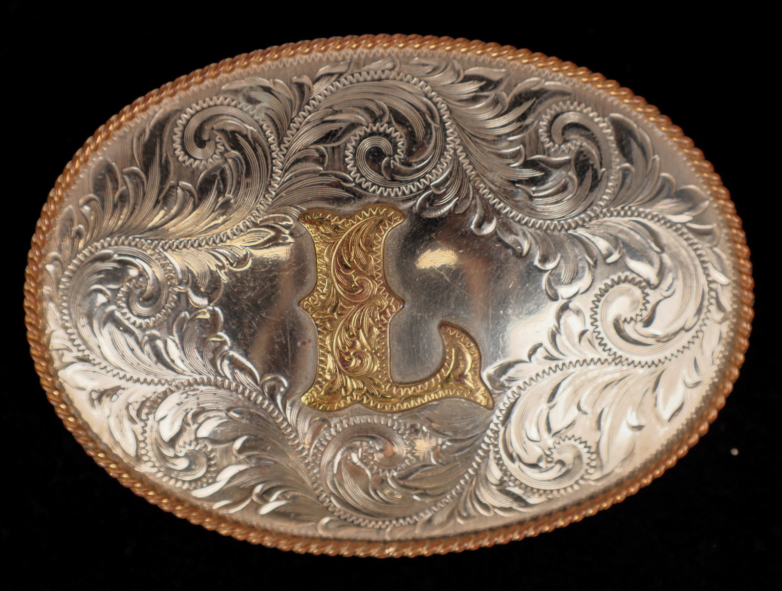 Belt Buckle, Oval with "L", German Silver [177884]: Oval "L" belt buckle, marked on reverse Montana Silversmiths/German Silver/Columbus Mont. Perfect for Larry, Lou etc. 2.6x3.6". Montana