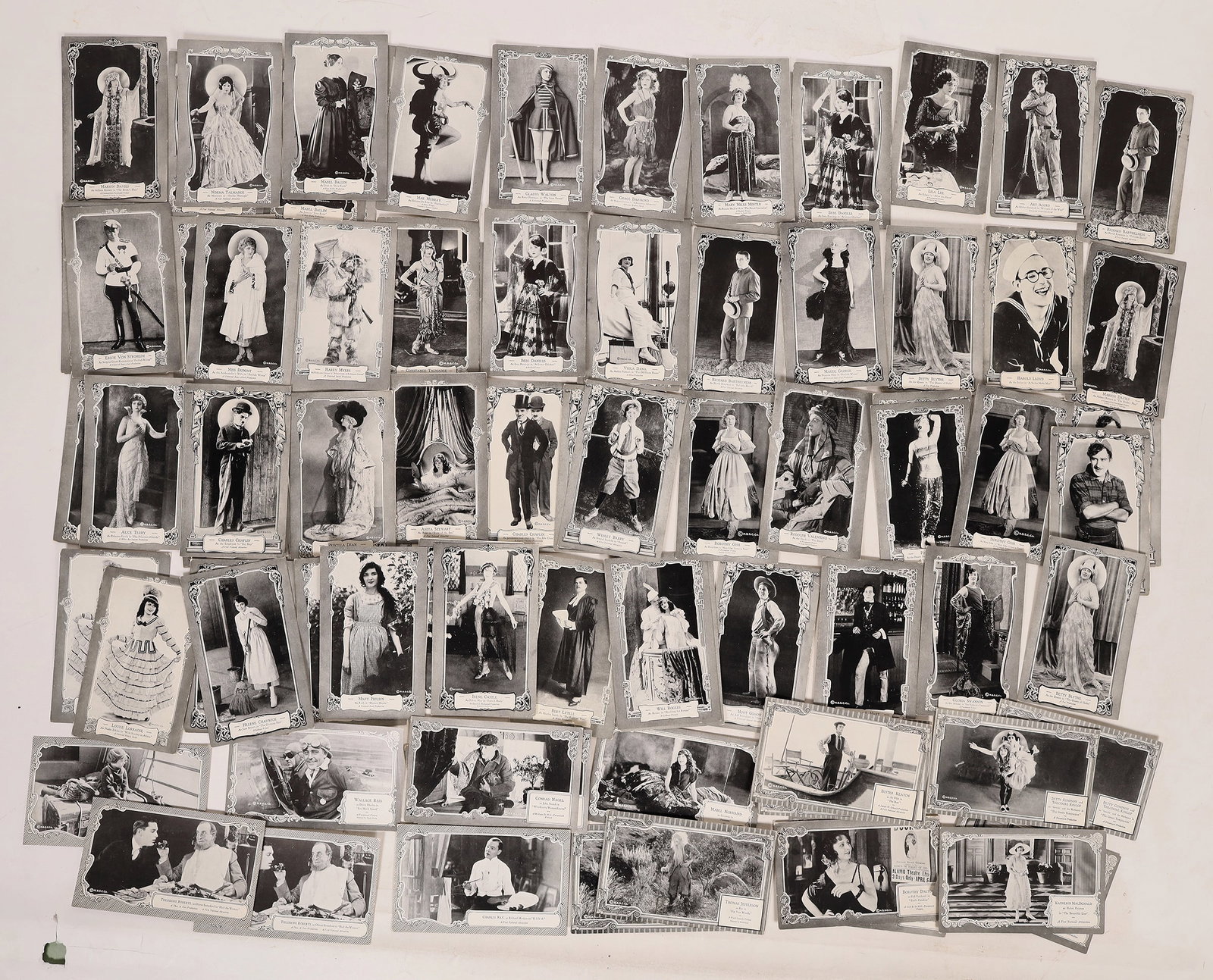 Sheffer Postcard Kings & Queens Movie Series (75) [178563]: Sheffer postcards, featuring the Kings & Queens Movie series (75). All are unused. They feature stars like William S. Hart, Dorothy Gish, Mary Miles Minter, Rudolph (Spelled Rodolph) Valentino, Frank