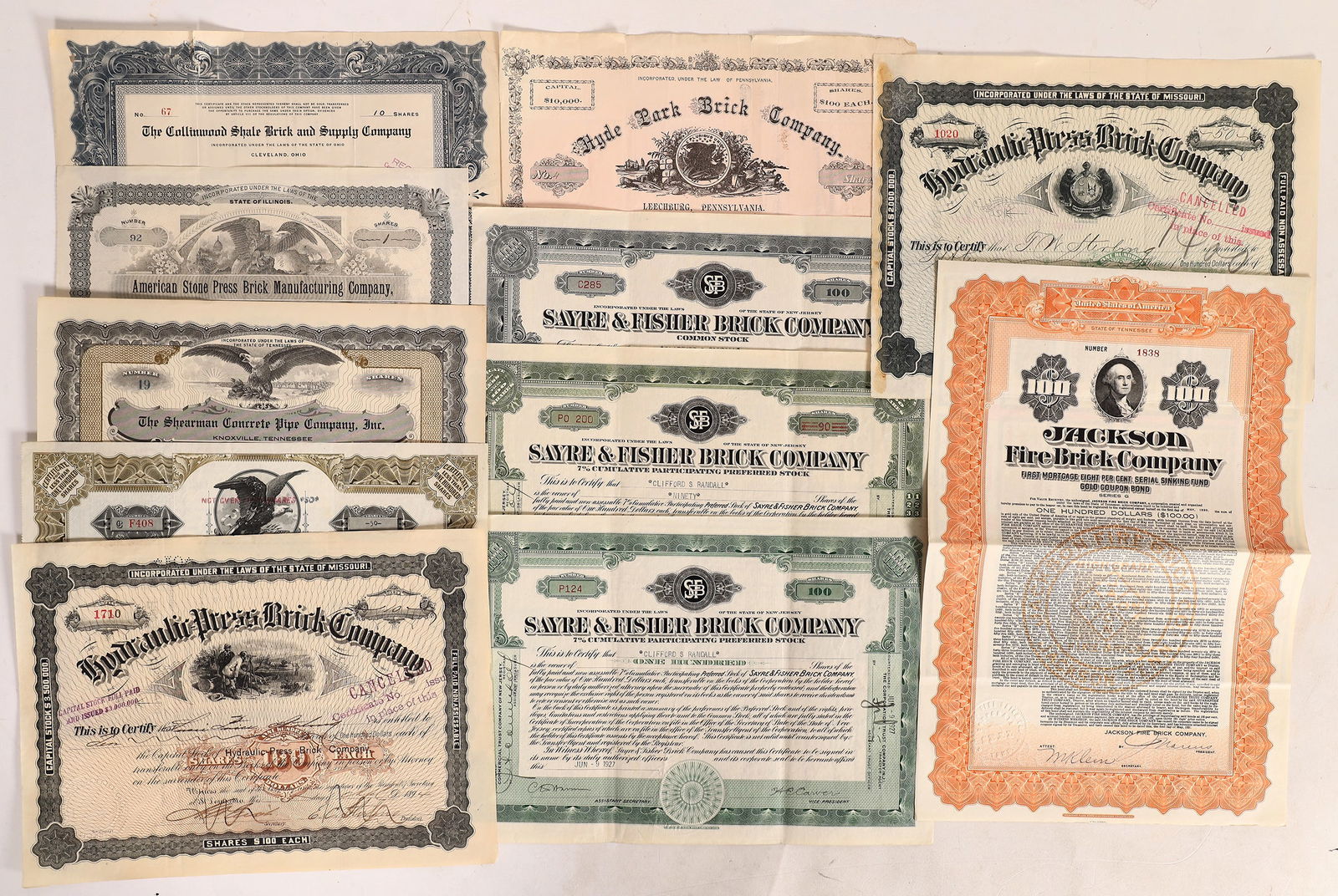Brick - Stock and Bond Collection (11) 1890-1927 [176837]: A collection of 11, includes 10 different stock certificates and one bond related to the brick making industry, c1890-1927. Includes American Stone Press Brick Manufacturing Co, incorp. Ill., c1893; a