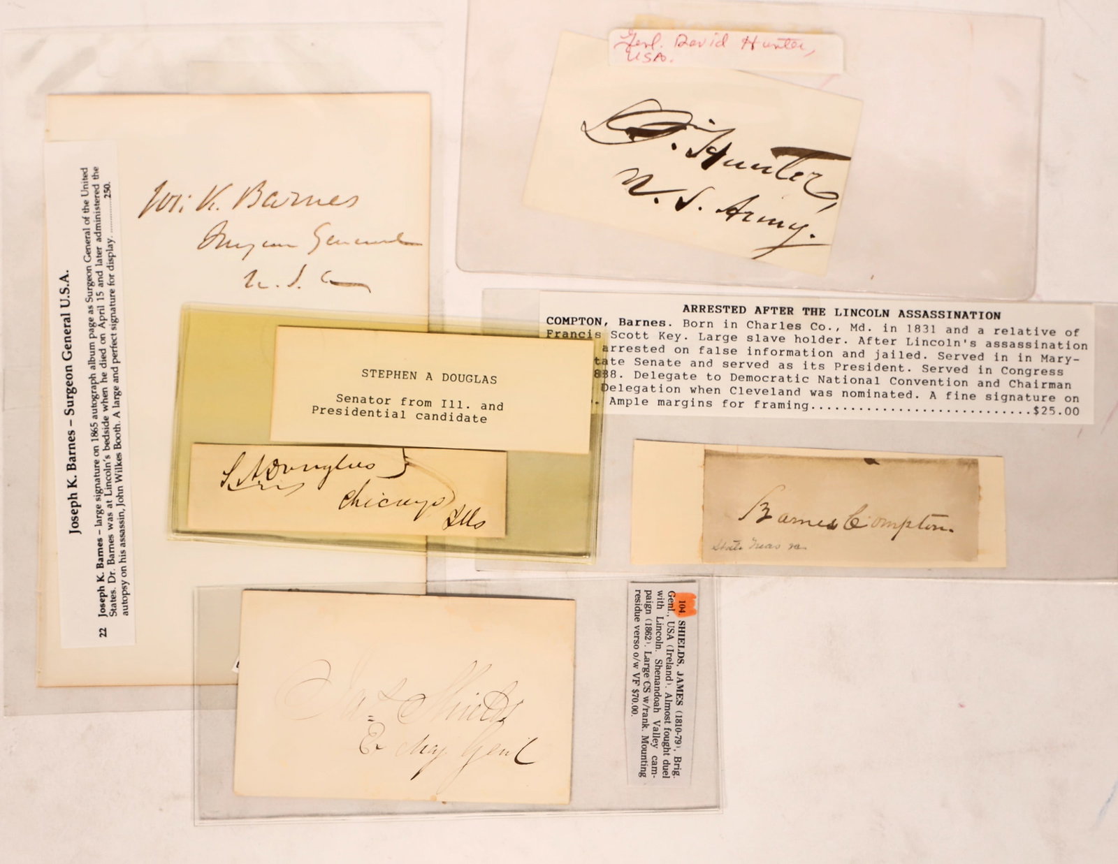 Lincoln: Autograph Collection [182495]: Lot of five autographs of men involved with Abraham Lincoln: 1) Stephen A. Douglas; Senator from Illinois and presidential opponent; "S. A. Douglas / Chicago Ills"; 3 1/2 x 1 inch. 2) Joseph K. Barnes