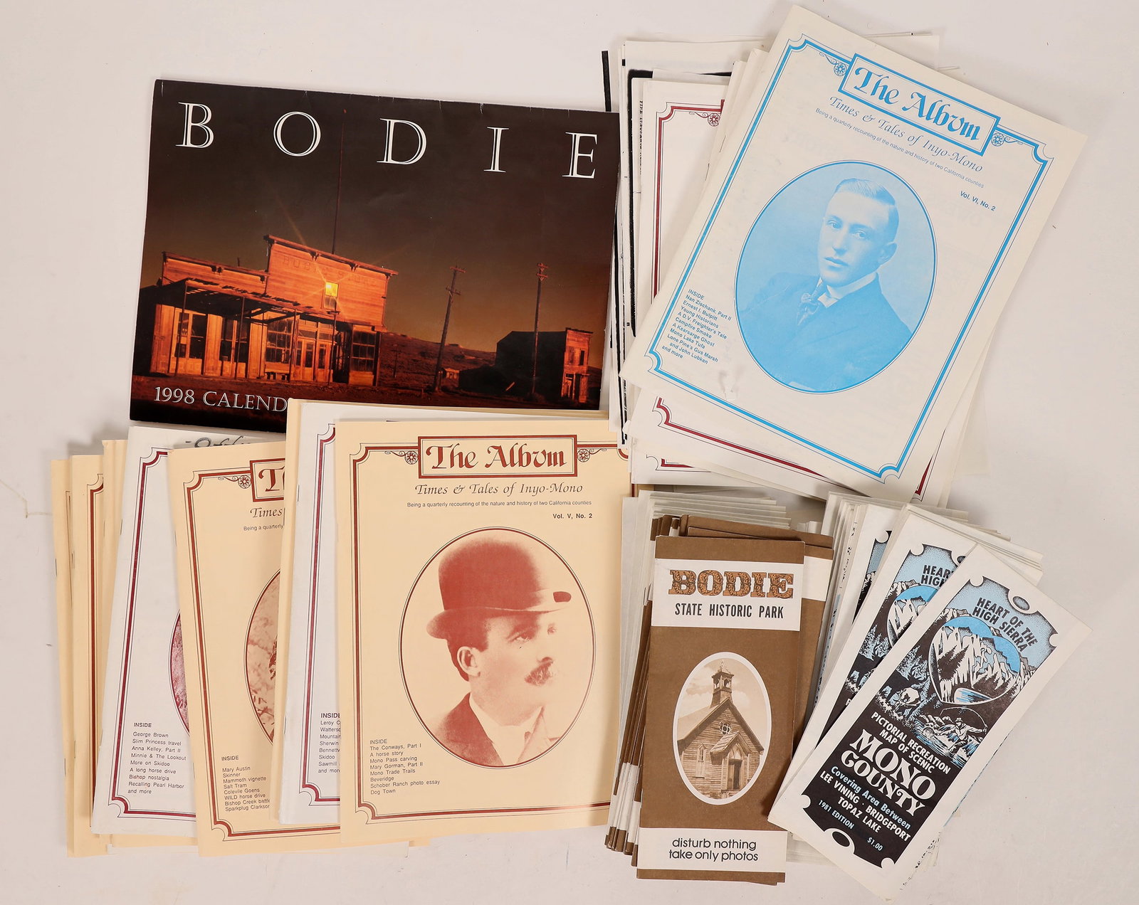 Bodie Tourism Group 1970-90 [181338]: Tourism informational magazines & brochures for the Bodie, CA, (Mono & Inyo counties) area, c1970s-90s. Includes the periodical "The Album- Times & Tales of Inyo-Mono," over 50 p. each, (17); pictoria
