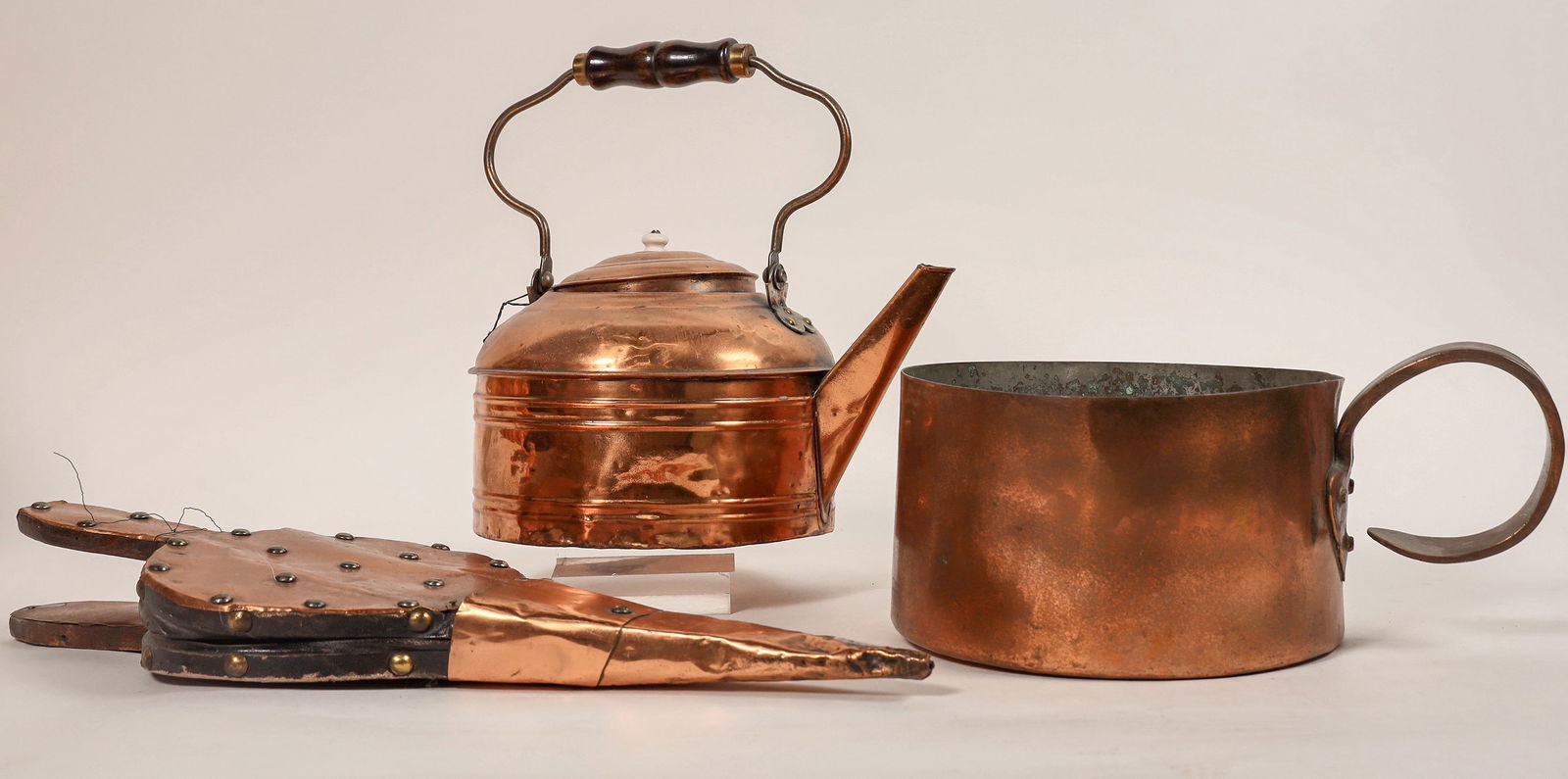 Copper Fire Place Trio [189736]: Lot of (3) copper cooking pieces. Large tea kettle, large pot, and bellows for pumping up fires. Copper handles, copper funnel blower on bellows, copper riveted over wood & leather construction. Large