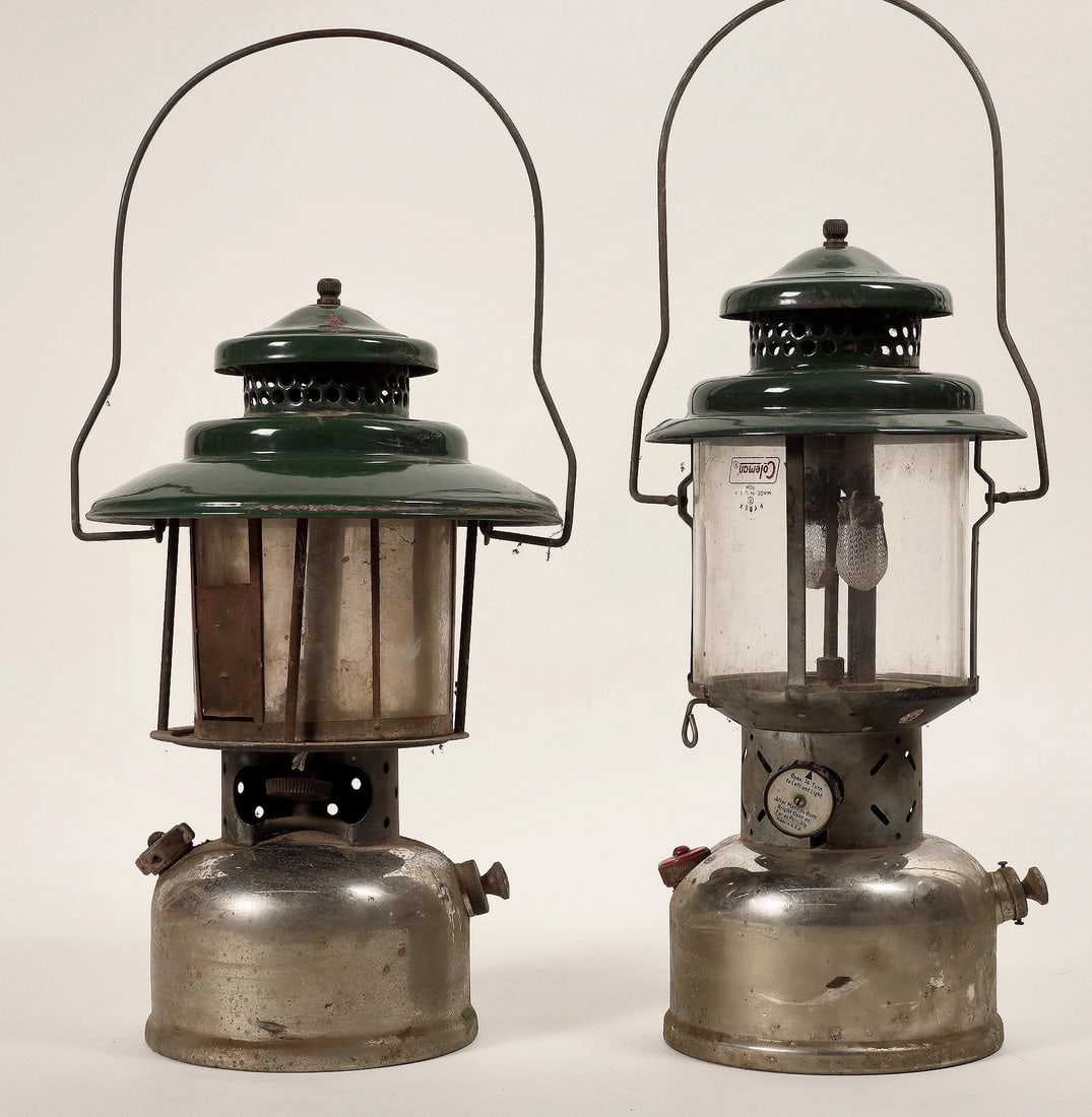 Coleman Lantern Pair [189759]: Pair of very early Coleman style Camping Lanterns. First is dated 1934, patent 1973184, second unit does not indicate a manufacturer, but appears very similar. Both feature glass globes, 6" diameter c