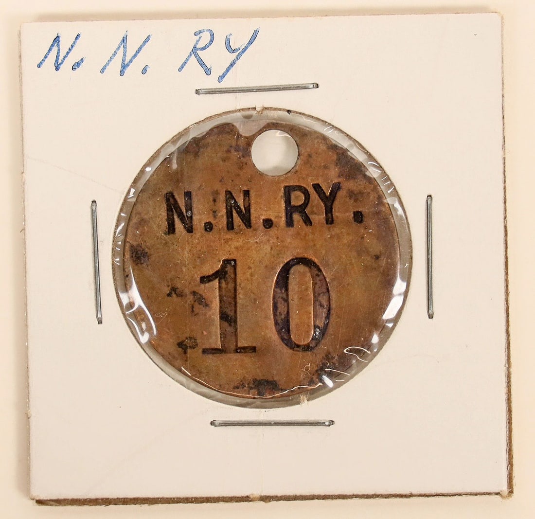 Northern Nevada Railway Luggage Tag EXTRA RARE [191330]: EXTRA RARE luggage tag from the Northern Nevada Railway. It's stamped N.N. RY 10. It measures about 1" and is in nice condition. Please see photos for more details.[]Date: Country (if not USA): State: