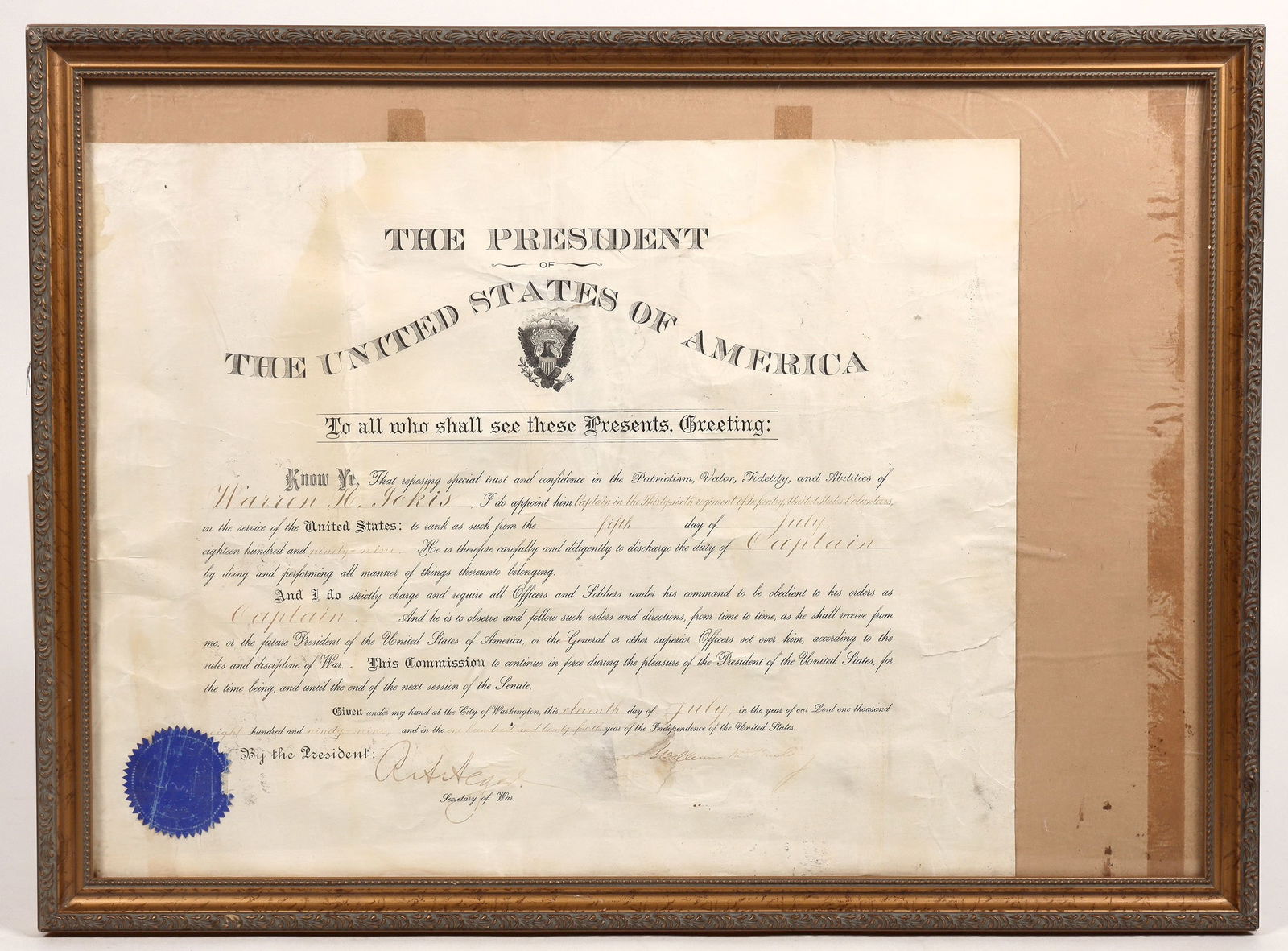 President McKinley Signature [191667]: A framed certificate, signed by both President William McKinley and secretary of war Russell A. Alger, appointing soldier Warren H. Ickis to the role of Captain in the 36th Regiment of Infantry, Unite