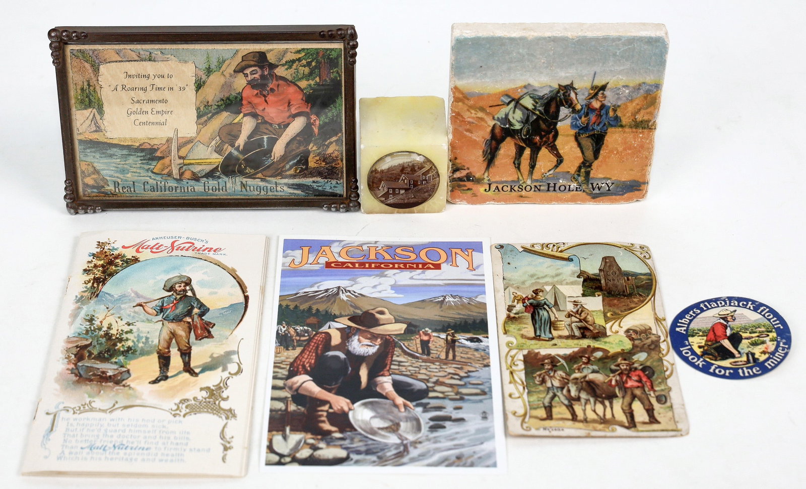 Americana Group [196278]: 3.75x3.75" Jackson Hole, WY coaster, framed souvenir from Sacramento Golden Empire Centennial with small pieces of California gold, 2 small labels, Arbuckle Coffee tradecard, Malt Sutrine advertising