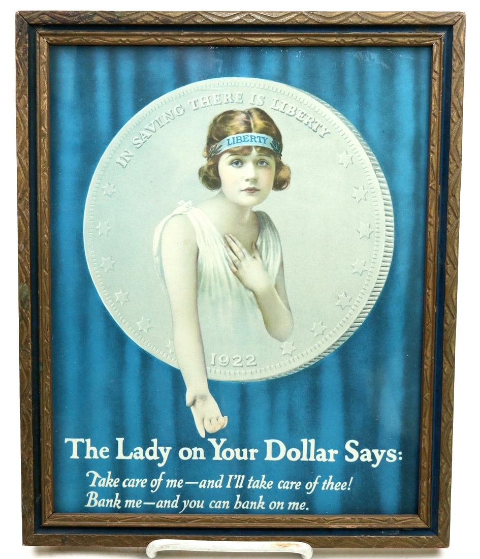In Saving There is Liberty Artwork [195192]: Framed Lady Liberty imploring: The Lady on Your Dollar Says: Take care of me-- and I'll take care of thee! Bank me -- and you can bank on me. The coin she speaks from is dated 1922 with the motto: In 