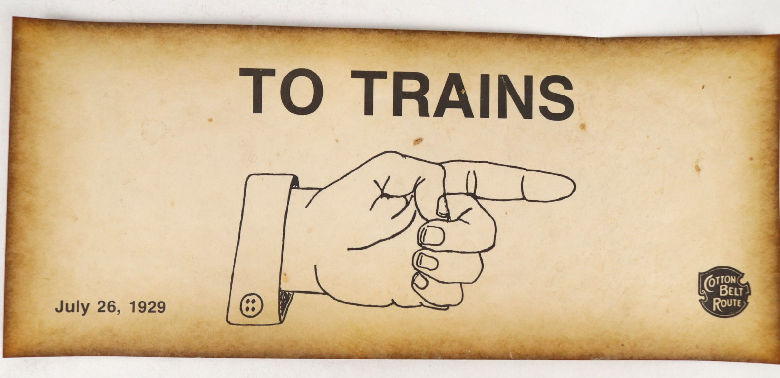 "To Trains" Paper Sign [195594]: Station Sign Reading "To Trains." It measures 11"x 5" and is issued by The Cotton Belt Route. In nice condition. Please see photos for more details.^Date: 1929Country (if not USA):State: City: Provena